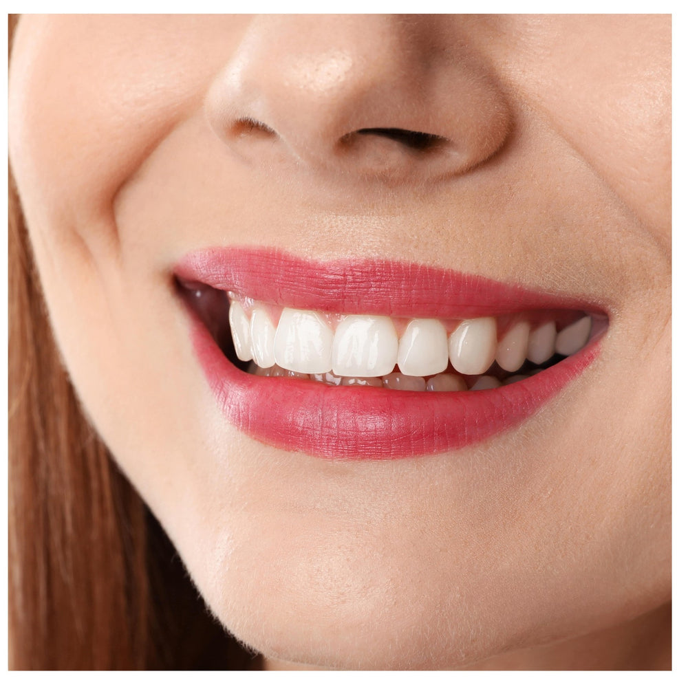 After image of woman with noticeably whiter teeth after using Ecosweetsmile teeth whitening powder